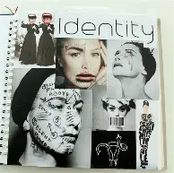 Art Director discussing work with colleague from physical portfolio