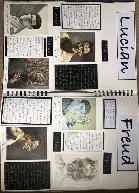 Art Director shaking hands with colleague while presenting physical portfolio