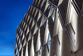 Bespoke lighting installation under stairs in neo-futuristic home